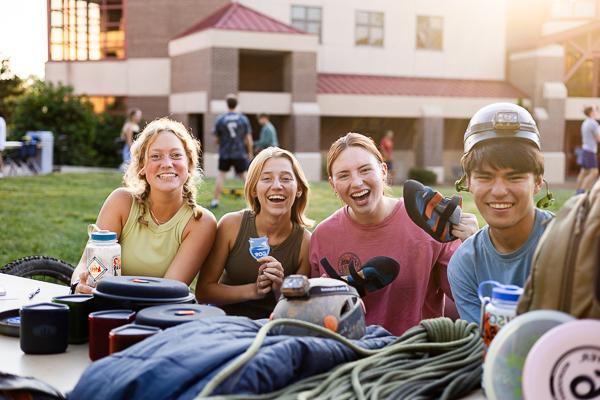 students at table outside